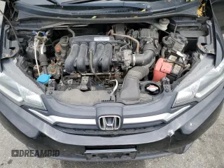 2015 Honda Fit EX-L z VIN 3HGGK5H89FM701322, wystawiony jako Copart lot #56565885 z przebiegiem 195 154 mil mil oraz Szkoda całkowita • Salvage title. Historia ofert i sprzedaży dostępna na DreamBid. Obrazek 11.