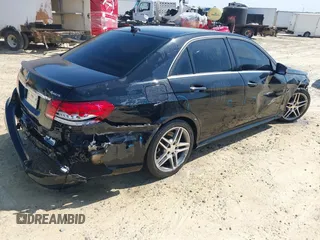 2014 Mercedes-Benz E 550 Sport with VIN WDDHF9BB2EA998695, listed as a IAAI auction lot 41683646 with 153,265 mi miles and . Bid and sale history available at DreamBid. Image 4.