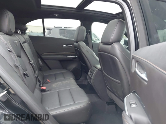 2021 Cadillac XT4 FWD Sport with VIN 1GYFZER40MF039140, listed as a IAAI auction lot 41287513 with 51,725 mi miles and . Bid and sale history available at DreamBid. Image 8.