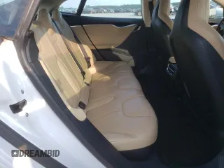 2014 Tesla Model S 60 с VIN 5YJSA1H18EFP33284, выставлен на аукционе Copart как лот 57434905 с пробегом 156 750 миль миль и Списание • Salvage title. История ставок и продаж доступна на DreamBid. Изображение 10.