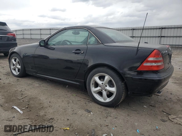 2002 Mercedes-Benz SLK 320 z VIN WDBKK65F12F250431, wystawiony jako Copart lot #86139214 z przebiegiem 72 356 mil mil oraz Czysty tytuł • Clean title. Historia ofert i sprzedaży dostępna na DreamBid. Obrazek 2.