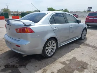 2008 Mitsubishi Lancer GTS with VIN JA3AU86U28U026507, listed as a IAAI auction lot 42033357 with 153,589 mi miles. Bid and sale history available at carsss.com. Image 4.