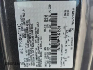2015 Ford Mustang V6 z VIN 1FATP8EM9F5372568, wystawiony jako Copart lot #57635655 z przebiegiem 85 856 mil mil oraz Szkoda całkowita • Salvage title. Historia ofert i sprzedaży dostępna na DreamBid. Obrazek 13.