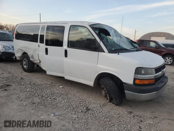 2014 Chevrolet Express Passenger LT with VIN 1GAZG1FGXE1187397, listed as a Copart auction lot 43209785 with 168,614 mi miles and Salvage title. Bid and sale history available at DreamBid. Image 4.