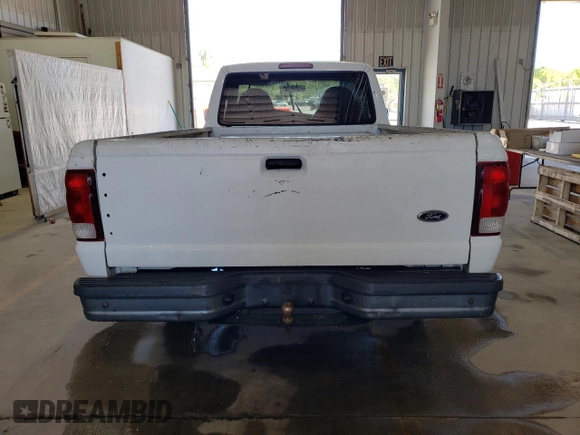 2000 Ford Ranger XL with VIN 1FTYR10V1YTA13232, listed as a Copart auction lot 54483055 with 217,473 mi miles and Salvage Title. Bid and sale history available at DreamBid. Image 6.