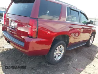 2018 Chevrolet Tahoe LT with VIN 1GNSKBKC6JR215585, listed as a IAAI auction lot 42043898 with 85,730 mi miles and . Bid and sale history available at DreamBid. Image 4.