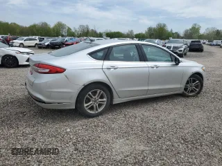 2018 Ford Fusion SE z VIN 3FA6P0H74JR112086, wystawiony jako Copart lot #56630275 z przebiegiem 123 300 mil mil oraz Szkoda całkowita • Salvage title. Historia ofert i sprzedaży dostępna na DreamBid. Obrazek 3.