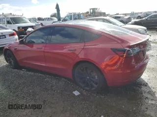 2020 Tesla Model 3 Long Range with VIN 5YJ3E1EB0LF712125, listed as a Copart auction lot 48514815 with 102,397 mi miles and Salvage Title. Bid and sale history available at DreamBid. Image 2.