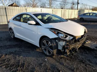2014 Hyundai Elantra Coupe with VIN KMHDH6AH3EU025665, listed as a Copart auction lot 84617794 with 112,994 mi miles and Salvage Title. Bid and sale history available at carsss.com. Image 4.