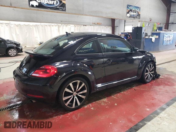 2012 Volkswagen Beetle Turbo with VIN 3VWVA7AT4CM665261, listed as a Copart auction lot 50562025 with 62,570 mi miles and Salvage Title. Bid and sale history available at DreamBid. Image 3.