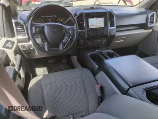2016 Ford F-150 XLT with VIN 1FTEW1EG2GKD88539, listed as a Copart auction lot 56975835 with 142,775 mi miles and Salvage title. Bid and sale history available at DreamBid. Image 8.