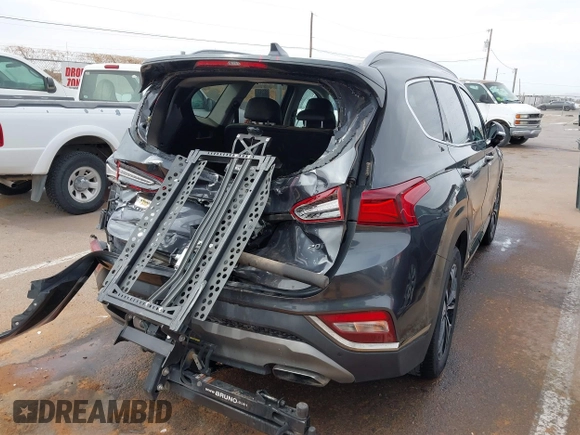 2020 Hyundai Santa Fe Limited with VIN 5NMS53AA8LH213608, listed as a IAAI auction lot 41787079 with 53,634 mi miles and . Bid and sale history available at DreamBid. Image 6.