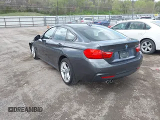 2015 BMW 4 Series 428i xDrive z VIN WBA4A7C5XFD415131, wystawiony jako IAAI lot #42100618 z przebiegiem 89 093 mil mil oraz . Historia ofert i sprzedaży dostępna na DreamBid. Obrazek 3.
