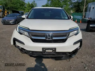 2019 Honda Pilot Elite with VIN 5FNYF6H09KB041935, listed as a Copart auction lot 60530515 with 57,526 mi miles and Salvage title. Bid and sale history available at DreamBid. Image 5.