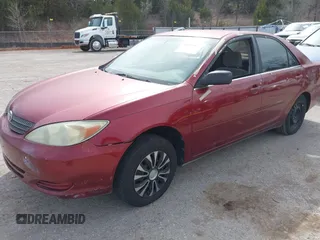 2004 Toyota Camry LE with VIN JTDBE32K840271548, listed as a IAAI auction lot 41835859 with 172,455 mi miles. Bid and sale history available at carsss.com. Image 2.