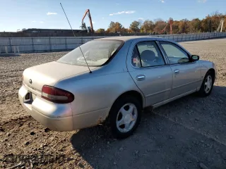 1997 Nissan Altima XE with VIN 1N4BU31DXVC166151, listed as a Copart auction lot 76300214 with 202,356 mi miles and Clean Title. Bid and sale history available at carsss.com. Image 3.