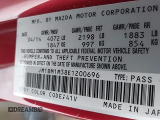 2014 Mazda 3 S Grand Touring with VIN JM1BM1M38E1200696, listed as a IAAI auction lot 41906426 with 50,048 mi miles and . Bid and sale history available at DreamBid. Image 9.
