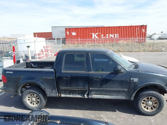 2003 Ford F-150 XLT with VIN 1FTRW08L83KA14760, listed as a IAAI auction lot 41820943 with 215,130 mi miles. Bid and sale history available at carsss.com. Image 13.