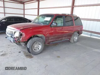 1999 Mercury Mountaineer z VIN 4M2DU55P5XUJ31186, wystawiony jako IAAI lot #42021103 z przebiegiem 141 887 mil mil oraz . Historia ofert i sprzedaży dostępna na DreamBid. Obrazek 2.