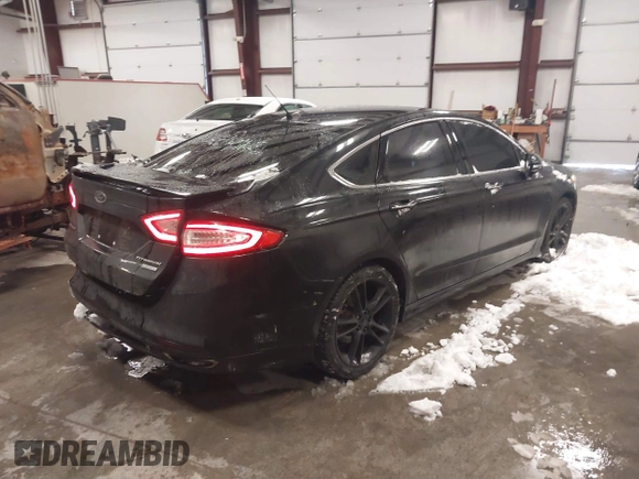 2014 Ford Fusion Titanium with VIN 3FA6P0K92ER336344, listed as a IAAI auction lot 41237225 with 178,169 mi miles. Bid and sale history available at carsss.com. Image 4.