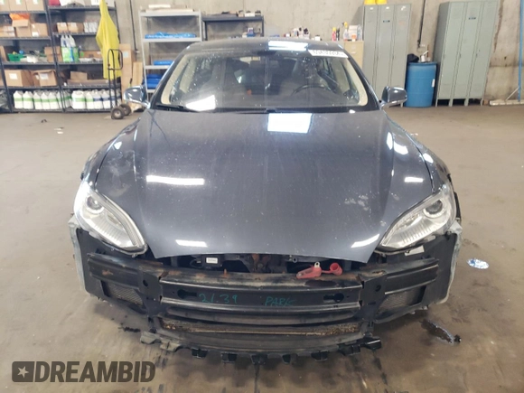 2014 Tesla Model S 60 with VIN 5YJSA1H14EFP53113, listed as a Copart auction lot 69430934 with 116,970 mi miles and Non repairable. Bid and sale history available at DreamBid. Image 5.