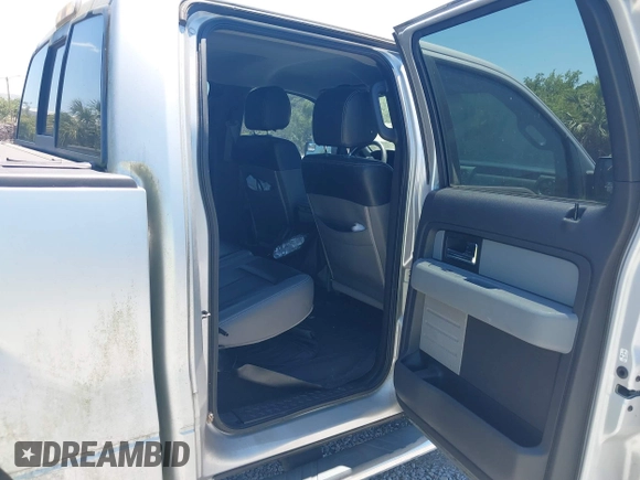 2013 Ford F-150 XL with VIN 1FTFW1EF1DKD27724, listed as a IAAI auction lot 42077088 with 188,885 mi miles. Bid and sale history available at carsss.com. Image 8.