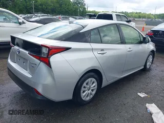 2022 Toyota Prius L Eco with VIN JTDKAMFU2N3161592, listed as a IAAI auction lot 42245464 with 146,891 mi miles and . Bid and sale history available at DreamBid. Image 4.