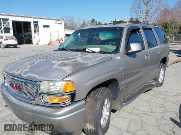 2002 GMC Yukon Denali z VIN 1GKEK63U82J341696, wystawiony jako IAAI lot #41772116 z przebiegiem 259 337 mil mil oraz . Historia ofert i sprzedaży dostępna na DreamBid. Obrazek 2.