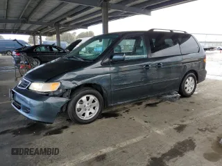 2004 Honda Odyssey EX-L z VIN 5FNRL18784B103373, wystawiony jako Copart lot #50798945 z przebiegiem 150 318 mil mil oraz Szkoda całkowita • Salvage title. Historia ofert i sprzedaży dostępna na DreamBid. Obrazek 1.