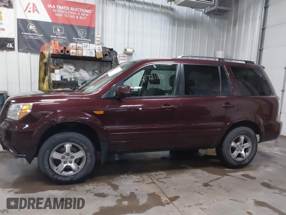 2007 Honda Pilot EX-L with VIN 5FNYF18537B017779, listed as a IAAI auction lot 41721110 with 98,724 mi miles. Bid and sale history available at carsss.com. Image 14.