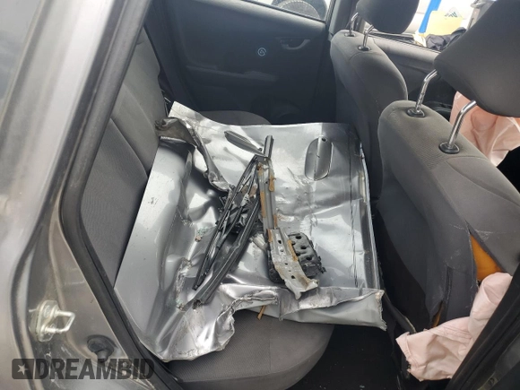 2009 Honda Fit with VIN JHMGE88249S025083, listed as a Copart auction lot 58121945 with Not provided miles and Salvage title. Bid and sale history available at DreamBid. Image 10.