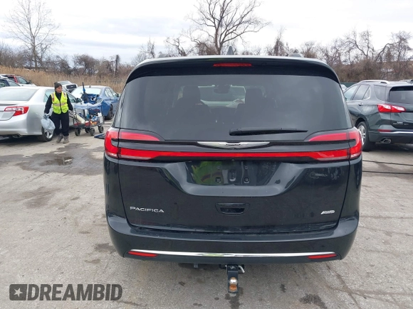2022 Chrysler Pacifica Touring L z VIN 2C4RC3BG6NR164599, wystawiony jako IAAI lot #41727606 z przebiegiem 17 078 mil mil oraz . Historia ofert i sprzedaży dostępna na DreamBid. Obrazek 16.