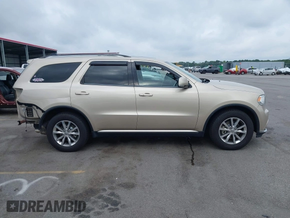 2015 Dodge Durango Limited with VIN 1C4RDHDG0FC834181, listed as a IAAI auction lot 42621753 with 122,442 mi miles and . Bid and sale history available at DreamBid. Image 14.