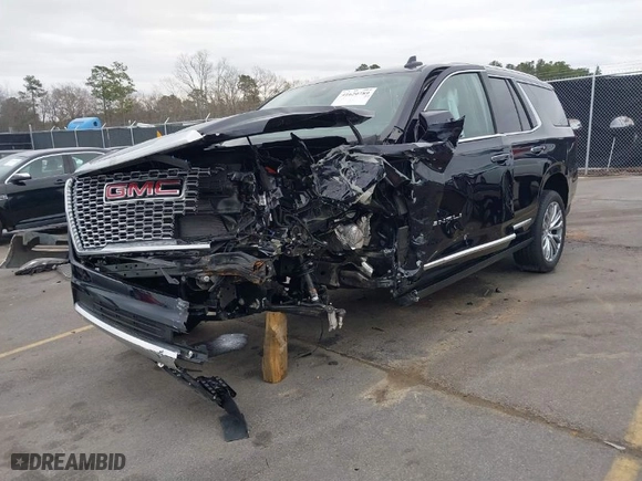 2023 GMC Yukon Denali with VIN 1GKS1DKL6PR480432, listed as a IAAI auction lot 41620789 with 25,395 mi miles. Bid and sale history available at carsss.com. Image 2.