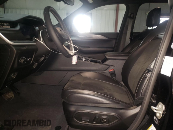 2023 Jeep Grand Cherokee Laredo with VIN 1C4RJJAG6P8867033, listed as a Copart auction lot 77134103 with 7,806 mi miles and Clean title. Bid and sale history available at DreamBid. Image 7.