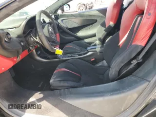 2019 McLaren 570S z VIN SBM13FAA1KW006404, wystawiony jako Copart lot #78088414 z przebiegiem 17 852 mil mil oraz Szkody całkowita. Historia ofert i sprzedaży dostępna na DreamBid. Obrazek 7.