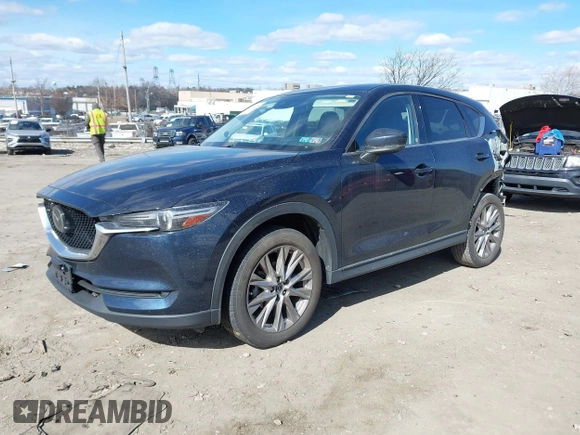 2020 Mazda CX-5 Grand Touring with VIN JM3KFBDM2L0768770, listed as a IAAI auction lot 41695058 with 44,192 mi miles. Bid and sale history available at carsss.com. Image 16.