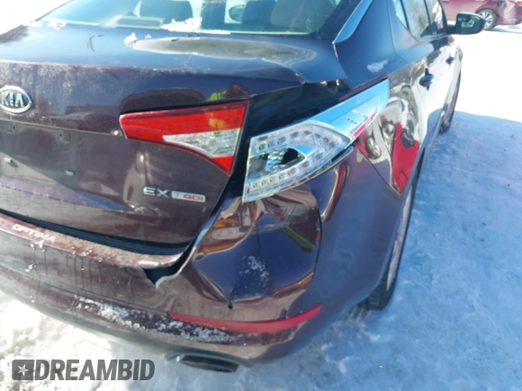 2012 Kia Optima EX with VIN 5XXGN4A61CG069907, listed as a IAAI auction lot 41275805 with 129,050 mi miles and . Bid and sale history available at carsss.com. Image 6.
