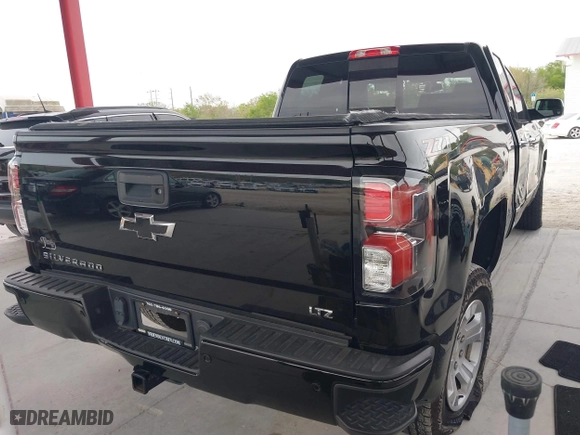 2018 Chevrolet Silverado 1500 LTZ with VIN 1GCVKSEC1JZ133409, listed as a IAAI auction lot 41369468 with 81,906 mi miles. Bid and sale history available at carsss.com. Image 4.