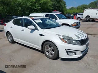 2015 Kia Optima LX z VIN 5XXGM4A74FG390274, wystawiony jako IAAI lot #42747048 z przebiegiem 197 378 mil mil oraz . Historia ofert i sprzedaży dostępna na DreamBid. Obrazek 1.
