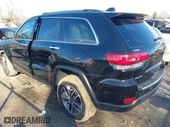 2021 Jeep Grand Cherokee 80th Anniversary with VIN 1C4RJFBG0MC801971, listed as a IAAI auction lot 41661098 with 31,961 mi miles and . Bid and sale history available at DreamBid. Image 3.