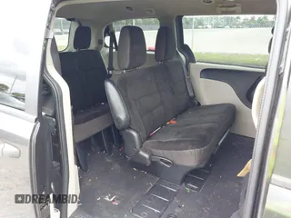 2019 Dodge Grand Caravan SE with VIN 2C4RDGBGXKR796974, listed as a IAAI auction lot 42008704 with 129,229 mi miles and . Bid and sale history available at DreamBid. Image 8.