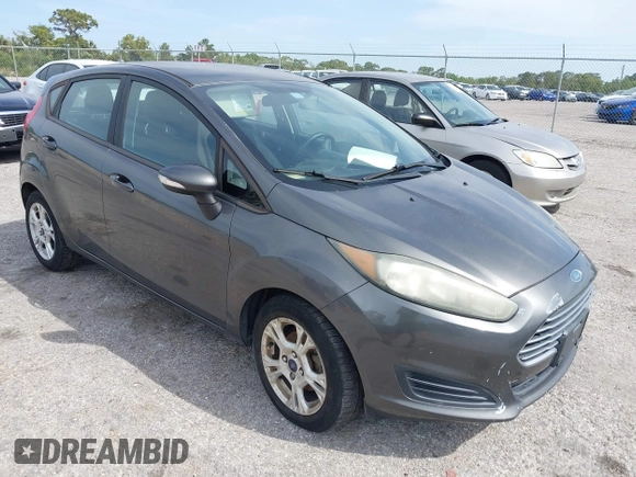 2016 Ford Fiesta SE with VIN 3FADP4EJ4GM129006, listed as a IAAI auction lot 42085892 with 146,044 mi miles. Bid and sale history available at carsss.com. Image 1.