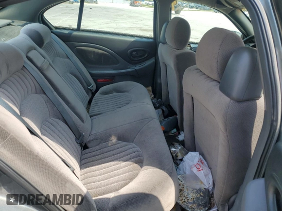 2004 Pontiac Bonneville SE z VIN 1G2HX52K94U178888, wystawiony jako Copart lot #51669505 z przebiegiem 184 886 mil mil oraz Szkoda całkowita • Salvage title. Historia ofert i sprzedaży dostępna na DreamBid. Obrazek 10.
