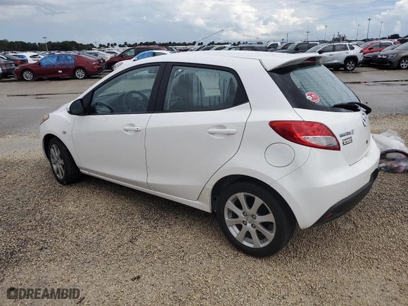 2012 Mazda Mazda2 Touring with VIN JM1DE1LY8C0137590, listed as a Copart auction lot 74488974 with 0 mi miles and Salvage Title. Bid and sale history available at carsss.com. Image 2.