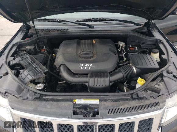 2013 Jeep Grand Cherokee Overland with VIN 1C4RJECG5DC528650, listed as a Copart auction lot 51581684 with 141,050 mi miles and Clean Title. Bid and sale history available at carsss.com. Image 11.