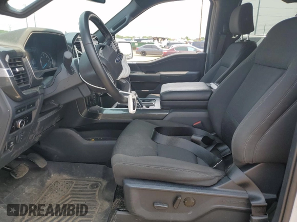 2023 Ford F-150 XL with VIN 1FTEW1EP7PFB66555, listed as a Copart auction lot 59384665 with 28,495 mi miles and Salvage title. Bid and sale history available at DreamBid. Image 7.