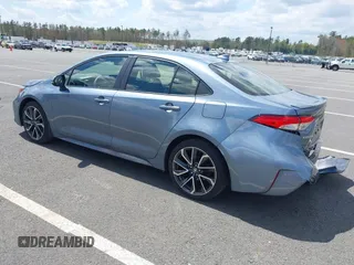 2021 Toyota Corolla SE with VIN JTDS4MCE0MJ077656, listed as a IAAI auction lot 42162598 with 32,714 mi miles and . Bid and sale history available at carsss.com. Image 3.
