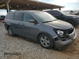 2010 Honda Odyssey Touring with VIN 5FNRL3H98AB005906, listed as a Copart auction lot 49037555 with 267,391 mi miles and Salvage Title. Bid and sale history available at carsss.com. Image 4.
