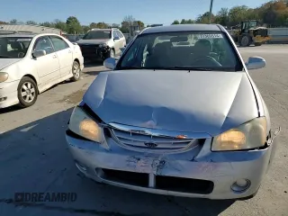2006 Kia Spectra EX with VIN KNAFE121965372856, listed as a Copart auction lot 77365514 with 316,947 mi miles and Clean Title. Bid and sale history available at carsss.com. Image 11.